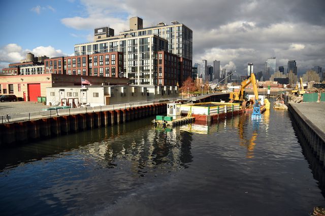 The first section of the Gowanus Canal being dredged is adjacent to a public promenade at 363 Bond Street and 365 Bond, a pair of new apartment towers built at the water’s edge.